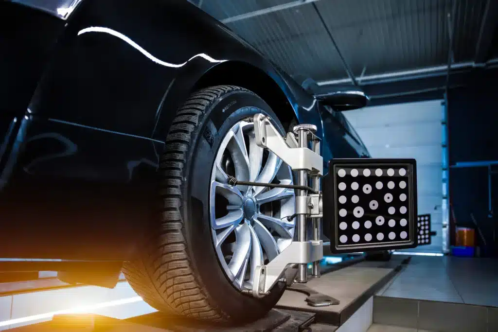 close up of vehicle on ramp using wheel alignment technology